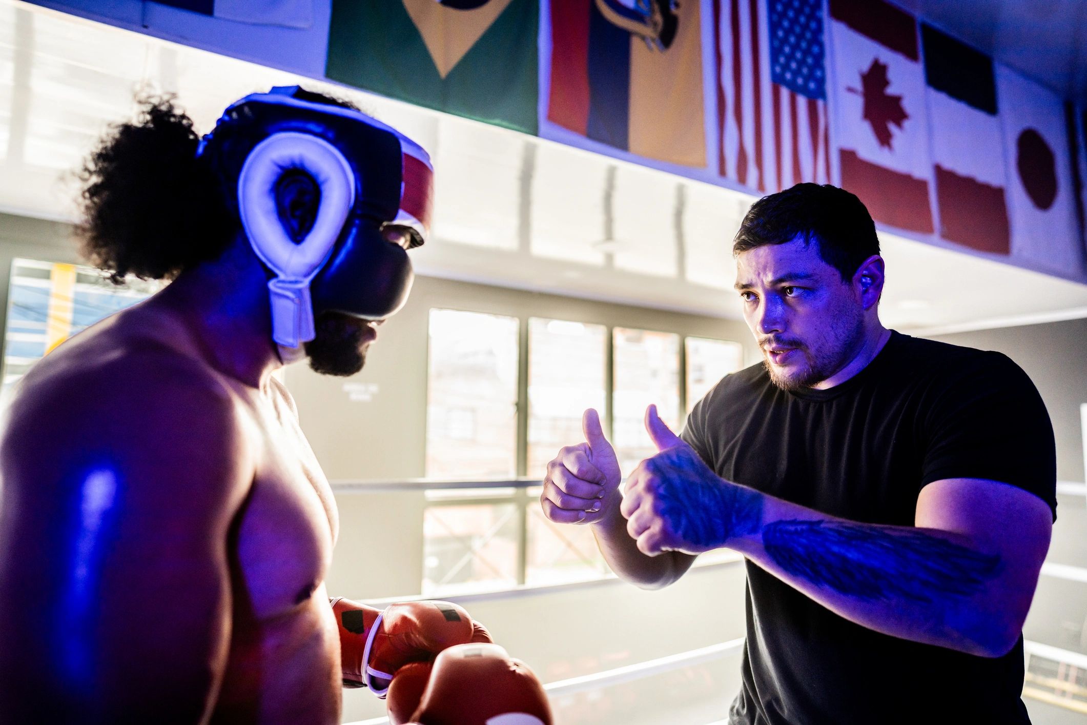 Coach supporting an athlete during training