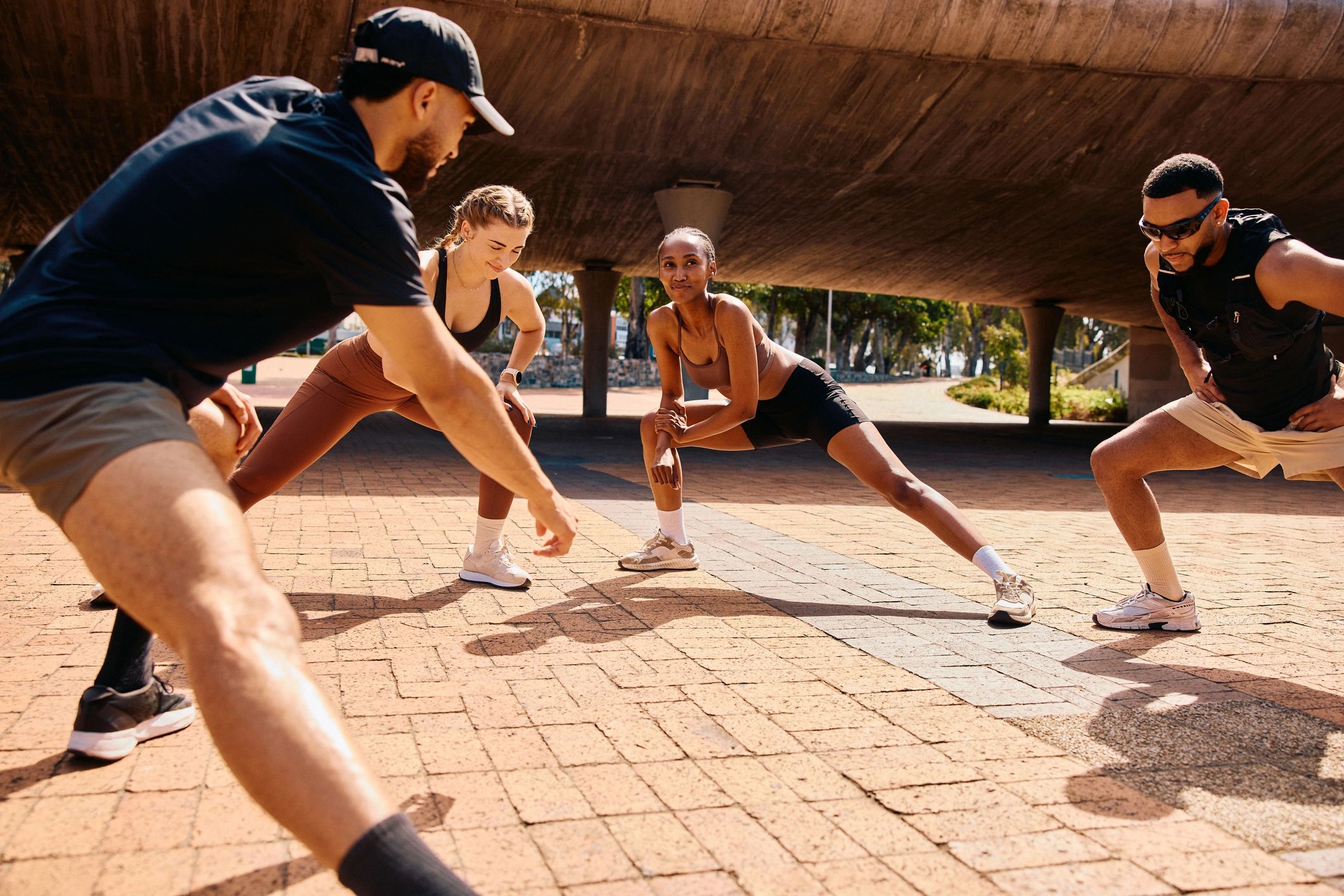 Group athletes warming up together outdoors